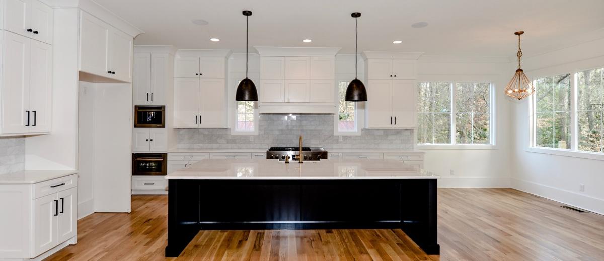 Marble Kitchen w Lots of Natural Light and White Oak Floors